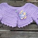 lila-tig-isi-cicekli-uzun-kollu-orgu-bolero
