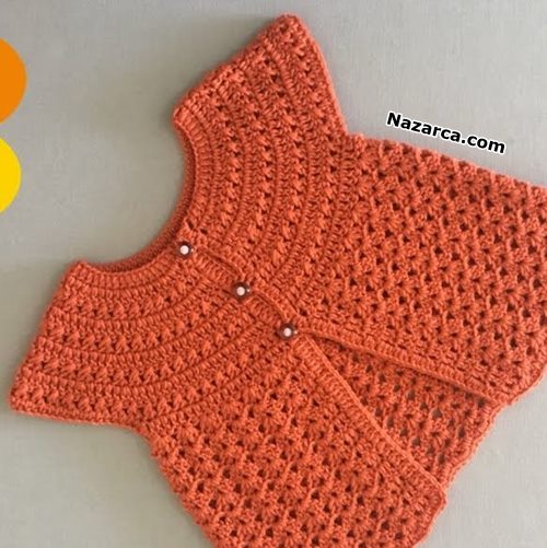 TURUNCUNUN GÜZELLİĞİNDE BEBEK YELEĞİ TIĞ ÜSTÜNDE TURUNCUNUN GÜZELLİĞİNDE BEBEK YELEĞİ TIĞ ÜSTÜNDE