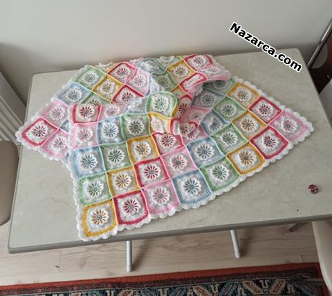 rengarenk-cicek-motifli-tv-bebek-battaniye